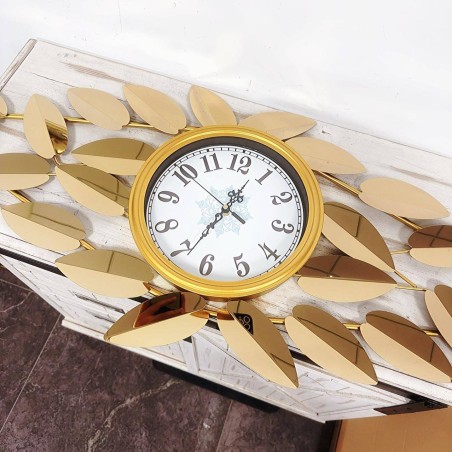 Elegant gold leaf decorated wall clock