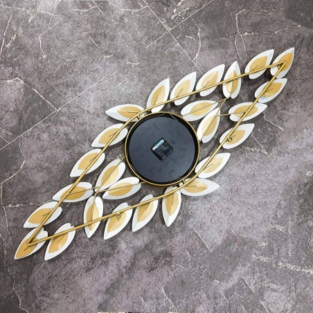 Elegant gold leaf decorated wall clock