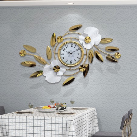Metal wall clock with gold floral decoration