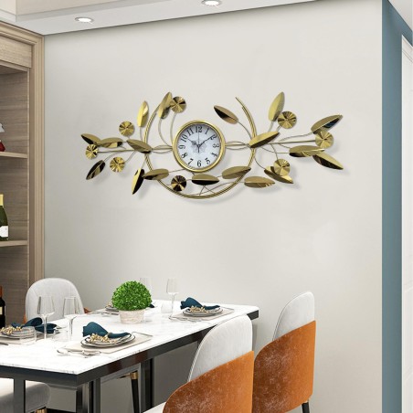 Golden floral wall clock with leaf decoration