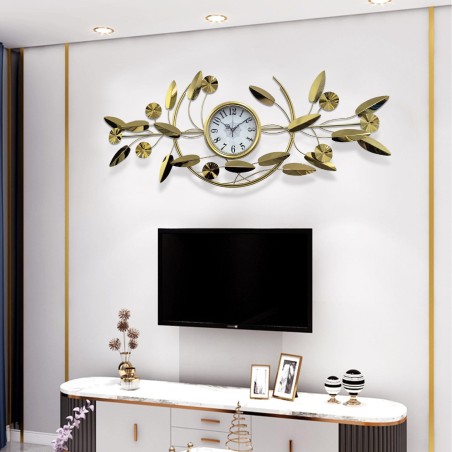 Golden floral wall clock with leaf decoration